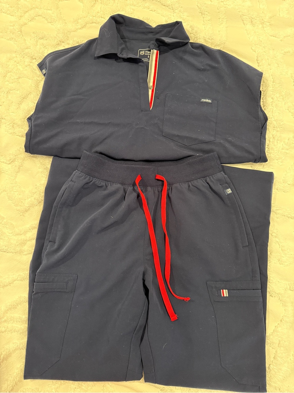 Women’s Navy Scrub Set top and Joggers with Red Drawcords